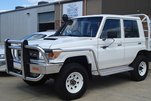 Landcruiser Toyota 70Series with a bullbar and sidestep